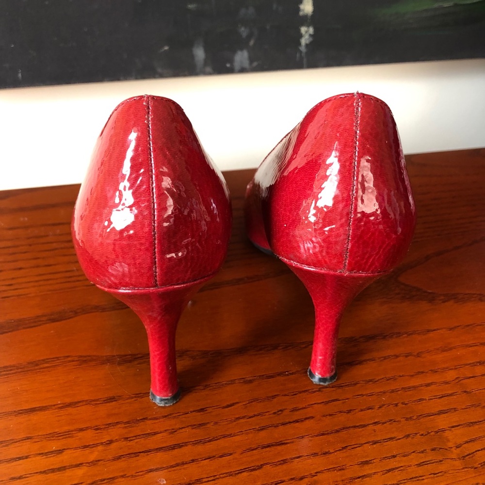 Red patent leather pumps